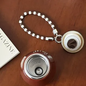 Portable retro stainless steel insulated water cup with beaded strap for daily use and travel.