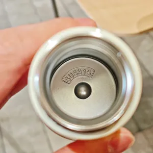 Detailed top view of portable stainless steel vacuum flask inner structure with SUS316 mark.