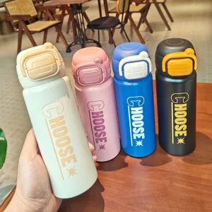 Stainless steel insulated water bottle with dual-drink lid and convenient portable handle.