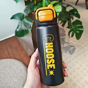 Close-up detail of the black stainless steel insulated water bottle with dual-drink flip lid.