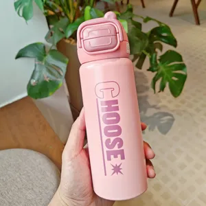 Pink stainless steel insulated water bottle with bounce lid, features CHOOSE letter print.