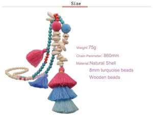 Boho multi-element handmade beaded necklace with natural shells, turquoise and colorful tassels.