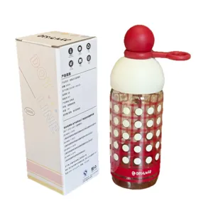 Elegante 300ml Glas-Wasserflasche mit rotem Kugelverschluss und Pünktchen-Muster für Alltag.