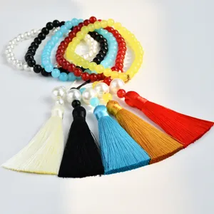 Bracciali di perle di preghiera colorati con grandi nappe di seta 33 perle gioielli buddisti