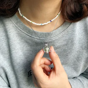 Ethnic vintage elephant pendant necklace set, luminous stone bead choker for men and women.