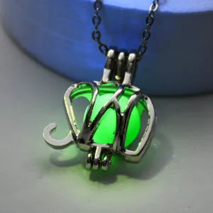 Vintage glowing luminous bead elephant pendant necklace with hollow metal chain for women and men.
