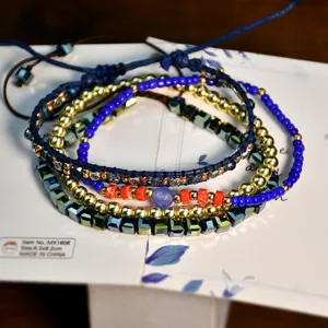 Handmade Miyuki beaded layered bracelet set with gemstone and metallic beads for women.
