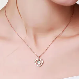 Rose gold heart projection necklace with zircon stones, elegant clavicle chain jewelry gift.
