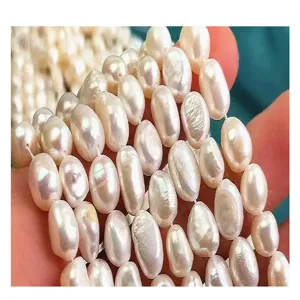 Close-up detail of natural freshwater baroque pearl strands, showing gorgeous luster and texture.