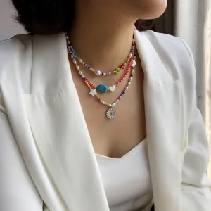 Colorful seed bead layered necklace with pearls and daisy flowers for women chic summer jewelry.