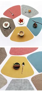 Close-up detail of fan-shaped PVC woven placemat for dining table heat insulation.