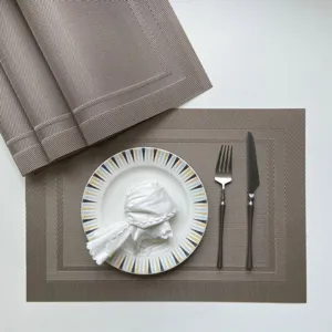 PVC woven placemat set European style heat insulation table mat for home and hotel dining table use.