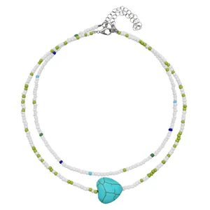Collana girocollo doppia con perline di rocailles e ciondolo cuore turchese boho.