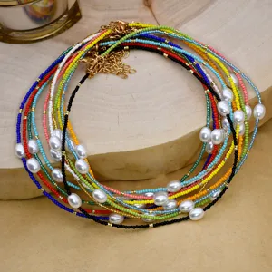 Elegante collana bohemien multistrato con perline colorate e perle per donne!