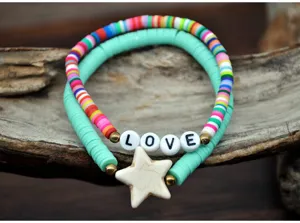 Colorful clay bead bracelet stack with star charm and love letters boho jewelry for women.