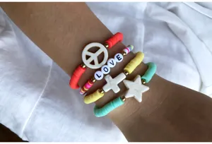 Colorful polymer clay bead bracelet set with love letter and star charms for women detail.
