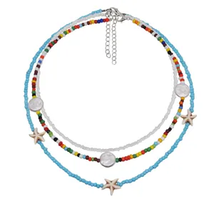 Collana di perline multistrato boho con perline colorate stella marina e ciondoli a moneta donna