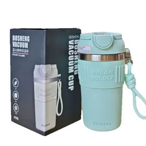 Stainless steel vacuum insulated coffee tumbler with silicone sleeve and portable strap