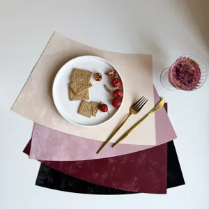 Waterproof leather table mats in multiple colors, elegant fan-shaped dining table mats.