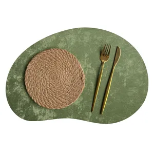 Set de table en cuir forme de cajou style nordique tapis isolant thermique étanche élégant.