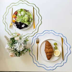 Aesthetic round embroidered placemat set with cute flower edge for dining table kitchen decor.