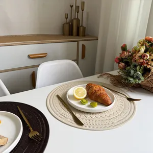 Ronde kunstlederen placemat met boho reliëfpatroon, waterdichte tafelmat voor de mooie eetkamer.