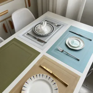 PVC woven placemats set, heat-resistant table mats for dining room, slip-resistant kitchen decor.