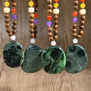 Retro natural stone beaded long necklace with irregular green gemstone pendant and wooden beads.