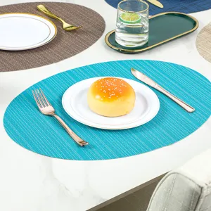 Oval PVC placemat waterproof heat-insulating non-slip table mat for home kitchen dining table decor.