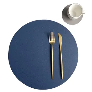 Set da tavola rotondo in pelle PU blu impermeabile resistente al calore per sala da pranzo.
