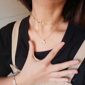 Layered gold choker necklace with crescent moon pendant, stylish jewelry for women and girls