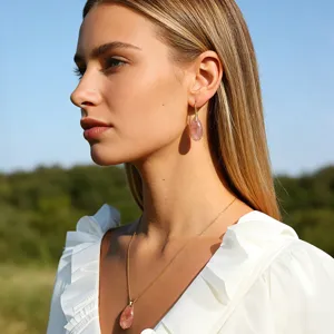 Exquisite multi-cut teardrop pink crystal necklace and drop earrings set for women.