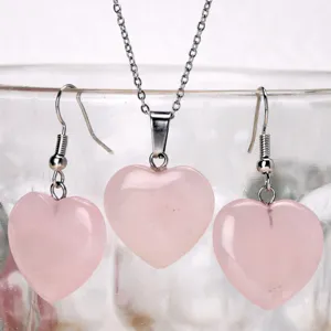 Natural pink crystal heart pendant necklace and matching earrings set detail view