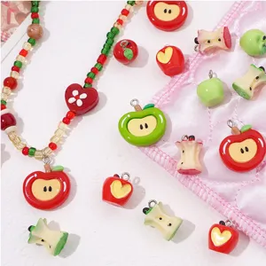 Resin red and green apple charms beads for handmade DIY jewelry crafting and accessories display.