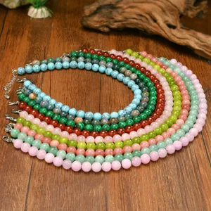 Details of the 10mm natural stone beaded necklace, showing colorful gemstone layers.