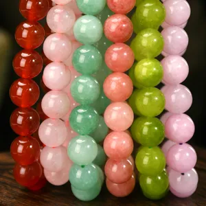 Colorful natural stone gemstone beads detail close up view for handmade jewelry crafting.