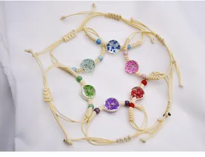 Bracciale intrecciato a mano in cotone di canapa fiori secchi colorati stile bohémien gioielli