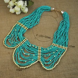 Boho multi-layer turquoise seed beaded statement necklace with gold metal accents.