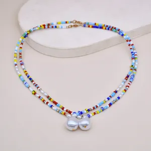 Collana multistrato di perle colorate con ciondoli in perle barocche moda donna chic