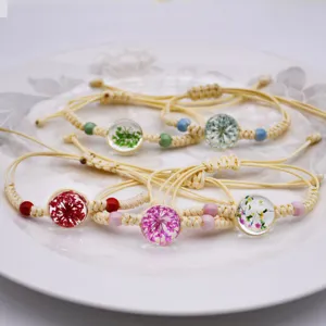 Bracciali intrecciati a mano in corda di cotone con sfere di vetro di fiori secchi stile boho donna