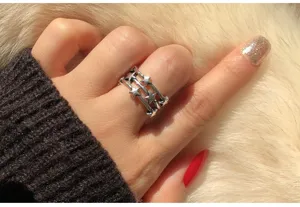 Vintage silver multi-layer star ring for women, stylish open adjustable knuckle finger jewelry.