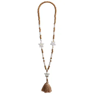 Lunga catena maglione di perline di legno con ciondoli stella bianca ed elegante nappina