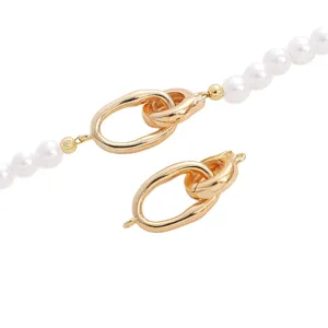 DIY pearl necklace clasp set with gold interlocking oval metal buckles for jewelry making accessories.