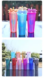 Colorful studded tumbler cups with sequin bows, diamond straw cups, creative drinkware.