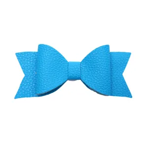 Blue leather bow detail, textured bowknot accessory, DIY craft supply for cups and hair.