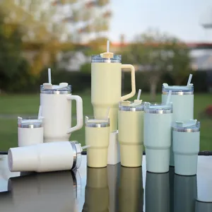 Outdoor set of stainless steel tumblers with handles and straws in assorted colors.