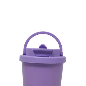 Close-up detail of the purple insulated cup lid with portable handle and straw sip design.