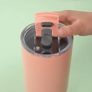 Stainless steel tumbler lid detail, pink double layer vacuum insulated travel mug cup cover.
