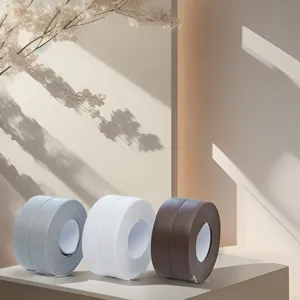 Waterproof sealing tape detail showing grey, white and brown caulk strips for kitchen sinks.