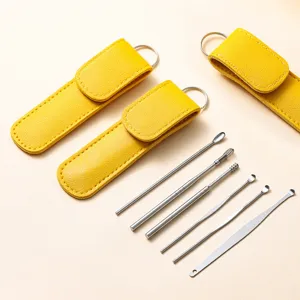 Stainless steel ear pick set detailed view, featuring 6 tools and yellow leather case.